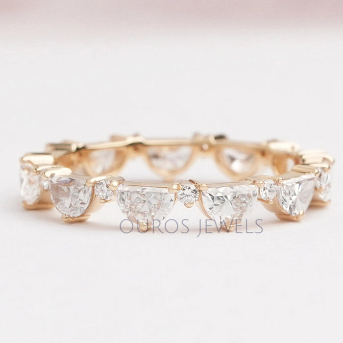 front view of half moon and round lab grown diamond eternity band yellow gold