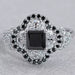 top view of princess black diamond with half moon halo engagement ring