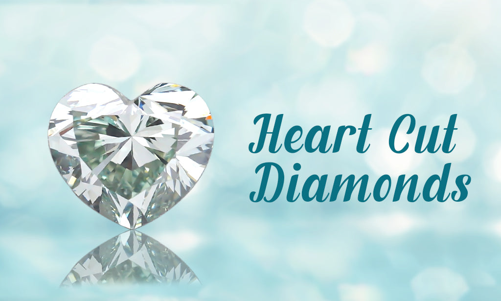 heart shaped lab grown diamond holded with tweezer