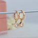 hexagon cut diamond huggie hoop earrings rose gold