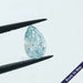 1.07 carat light blue diamond pear shape lab grown loose stone held with tweezer