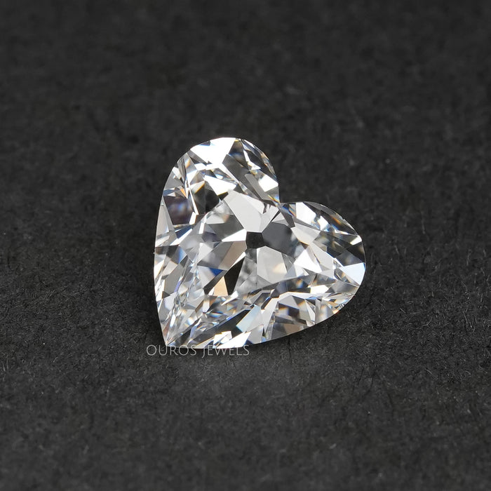 front view of old mine heart cut lab grown diamond on black fabric