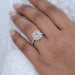 asscher cut lab diamond halo engagement ring in finger
