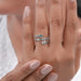baguette and pear cut lab diamond spiral colored engagement ring on model&#39;s finger