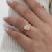 heart shape diamond bezel-set engagement ring in womens' finger
