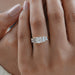 asscher and baguette cut lab diamond five stone engagement ring in finger