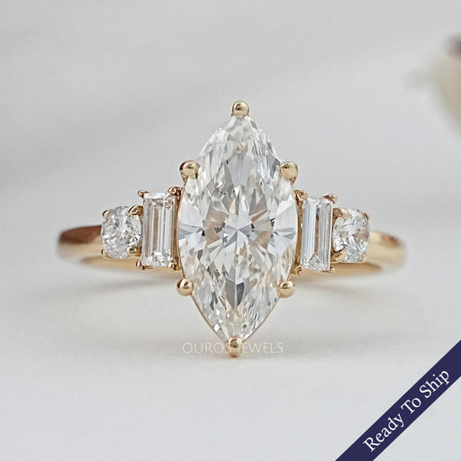 front view of marquise and baguette cut diamond five stone engagement ring