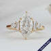 front view of marquise and baguette cut diamond five stone engagement ring