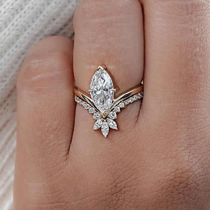 front view of marquise-cut lab diamond wedding ring set with yellow gold band