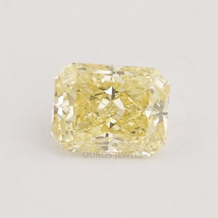front view of fancy yellow radiant cut lab created diamond loose