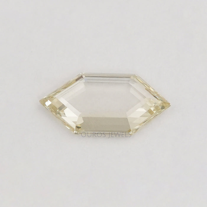 front view of fancy yellow hexagon long portrait cut diamond lab grown