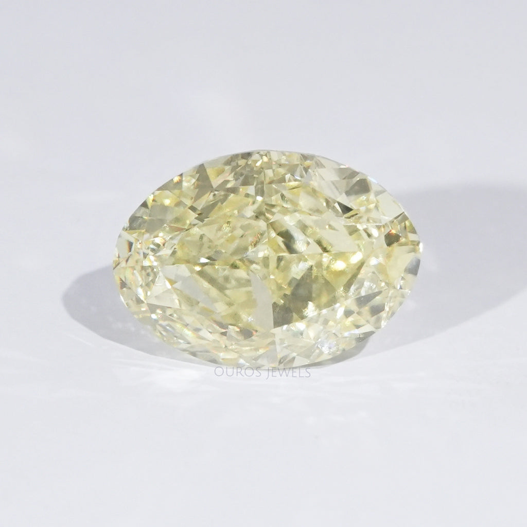 front view of fancy yellow modified oval cut lab grown diamond loose