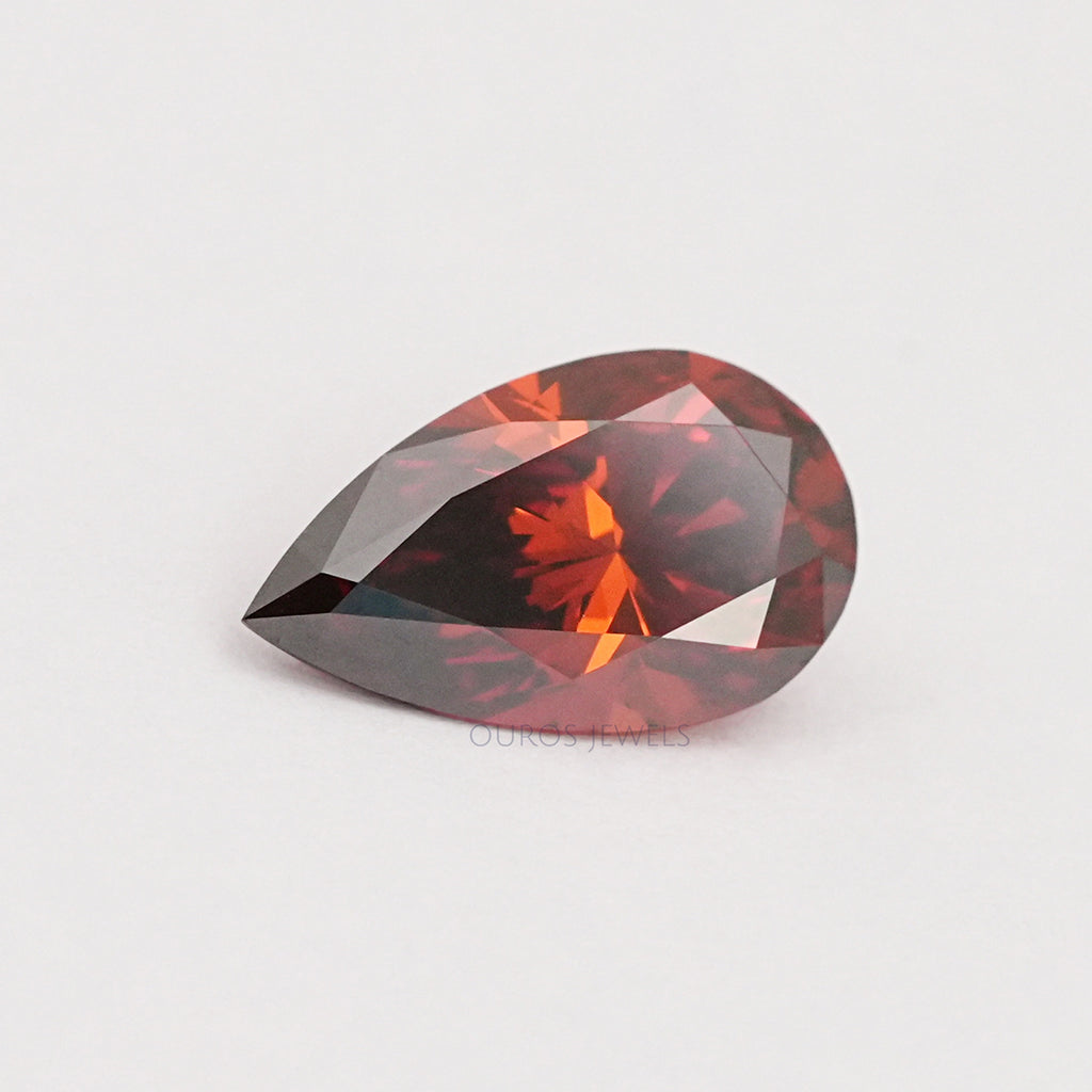 front view of red pear shaped lab grown diamond loose