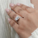 old european round diamond button back engagement ring on model's hand