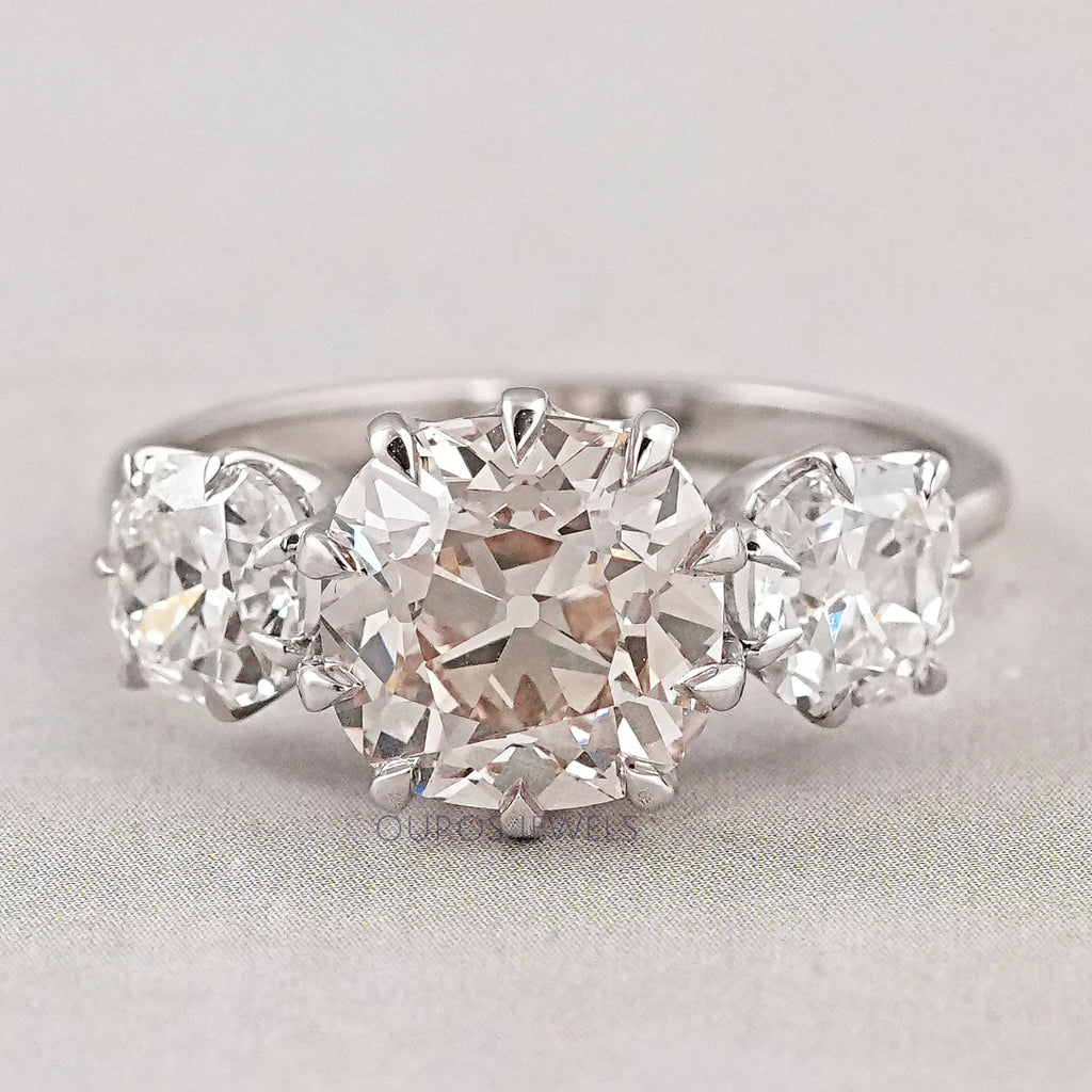 front view of three old mine cushion cut lab diamond engagement ring
