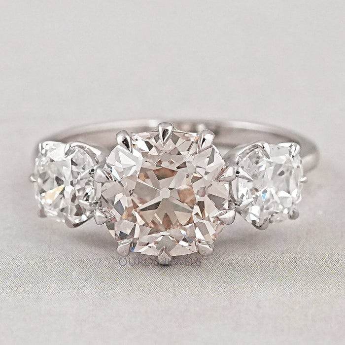 front view of three old mine cushion cut lab diamond engagement ring
