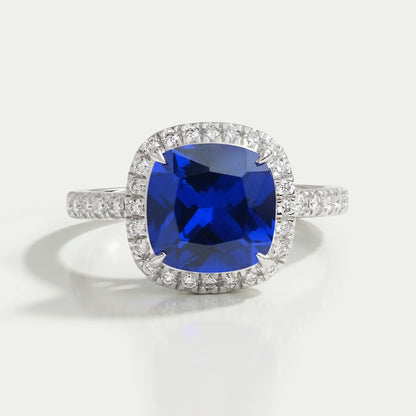 Bague de fiançailles avec halo de diamants taille coussin bleu naturel