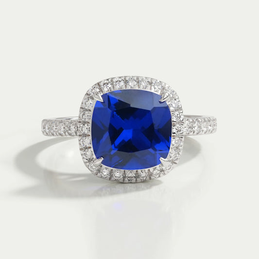 Bague de fiançailles avec halo de diamants taille coussin bleu naturel