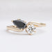 front view of natural black pear-cut lab-grown diamond two-stone colored wedding band