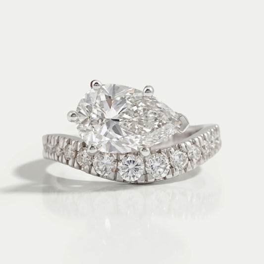 East West Pear Cut Diamond Wave Ring