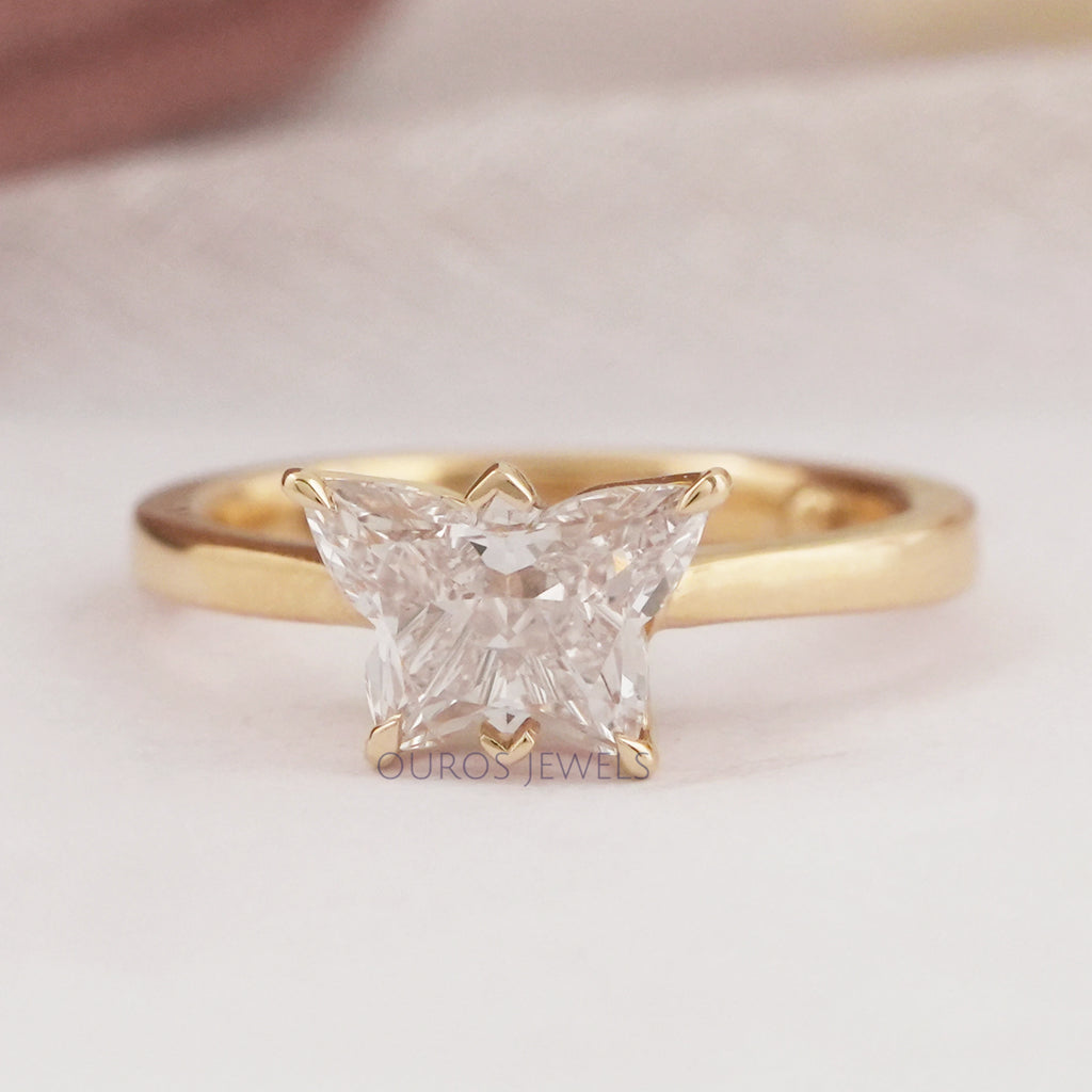 front view of pink butterfly shape lab diamond solitaire proposal ring