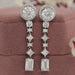 front view of multi shaped diamond floating halo basket setting drop earrings