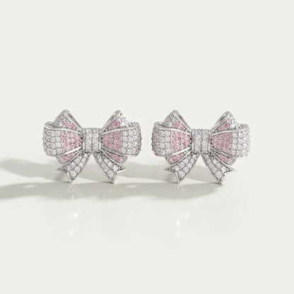 Boucles d'oreilles à tige en forme de nœud avec diamants taillés en rond