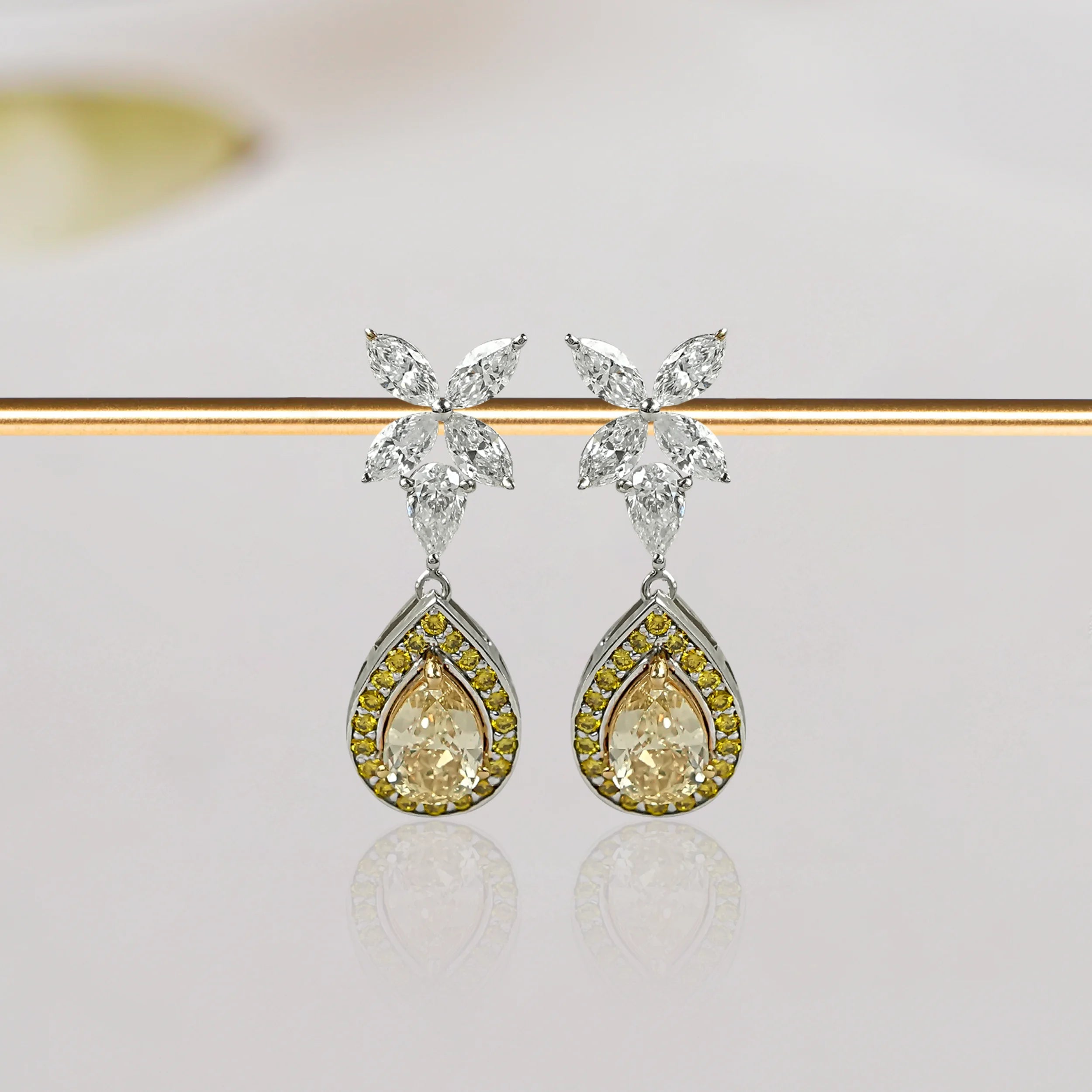 Yellow pear  diamond drop earrings