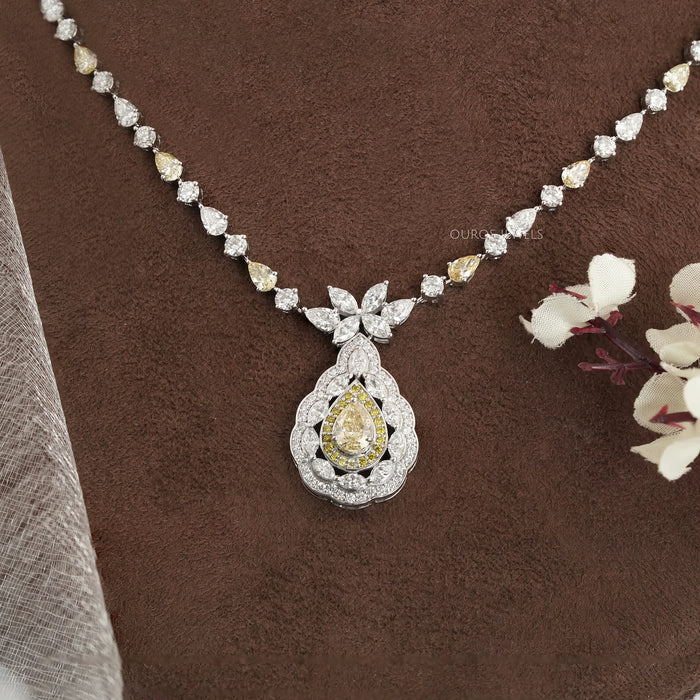 Collier en forme de larme avec poire jaune et diamant blanc