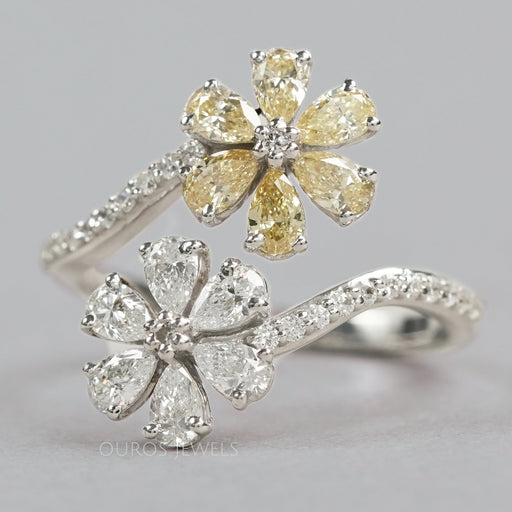 front view of twin flower-shaped yellow pear cut lab diamond bypass engagement ring