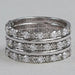 front view of round-cut diamond half eternity three row colored wedding band
