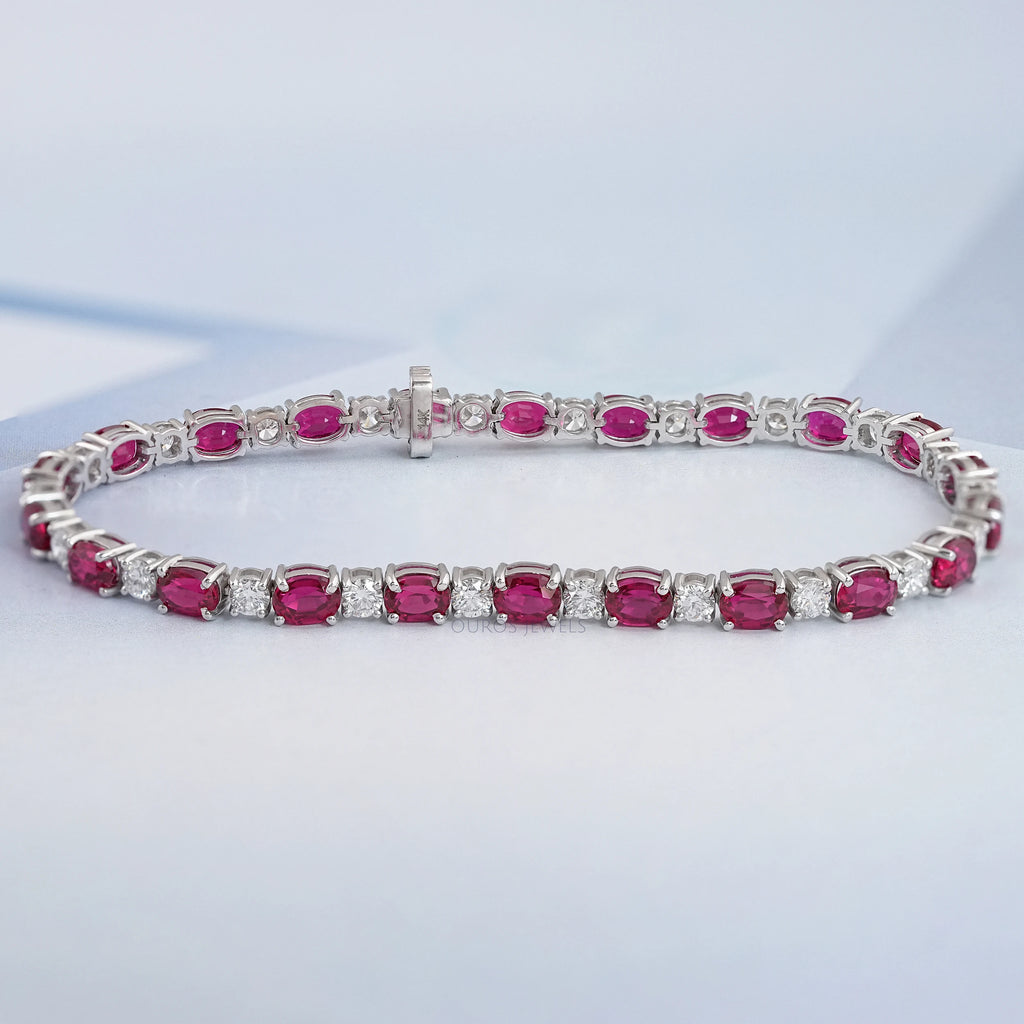 front view of oval cut pink ruby gemstone bracelet sterling silver