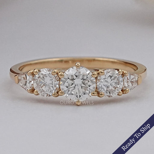 front view of round and shield cut lab diamond five stone engagement ring