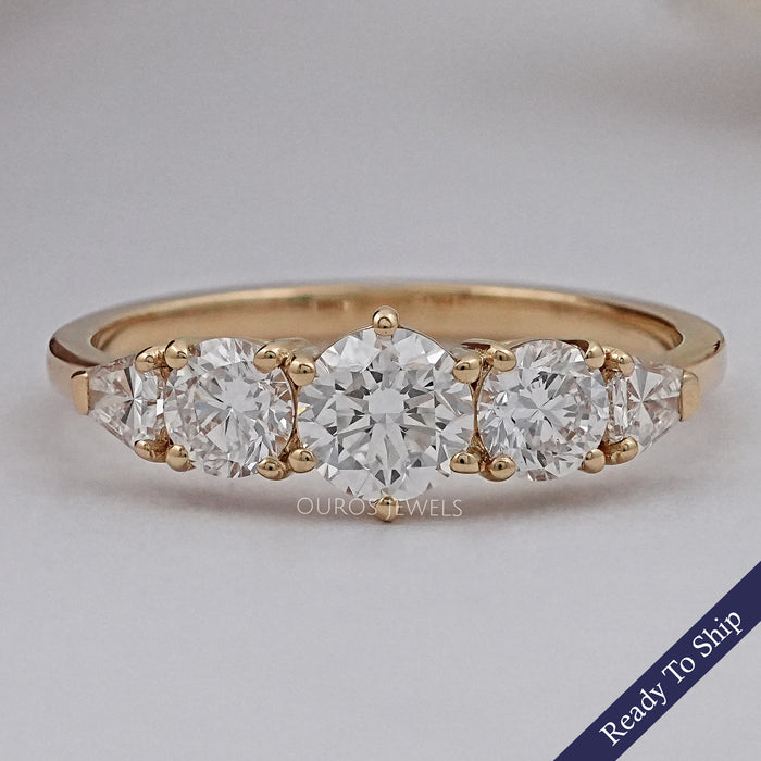 front view of round and shield cut lab diamond five stone engagement ring