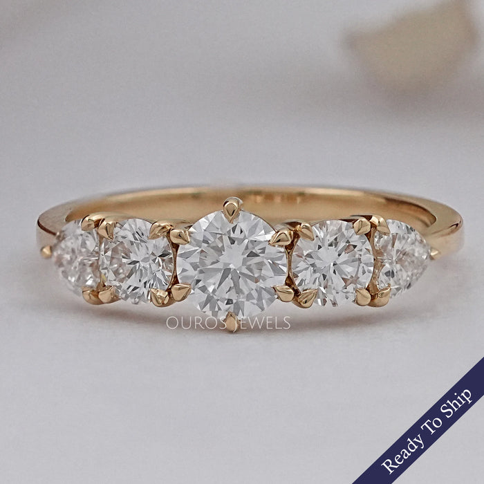 front view of round and heart cut lab diamond five stone engagement ring