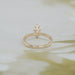 flat lay back view of marquise cut solitaire lab diamond engagement ring