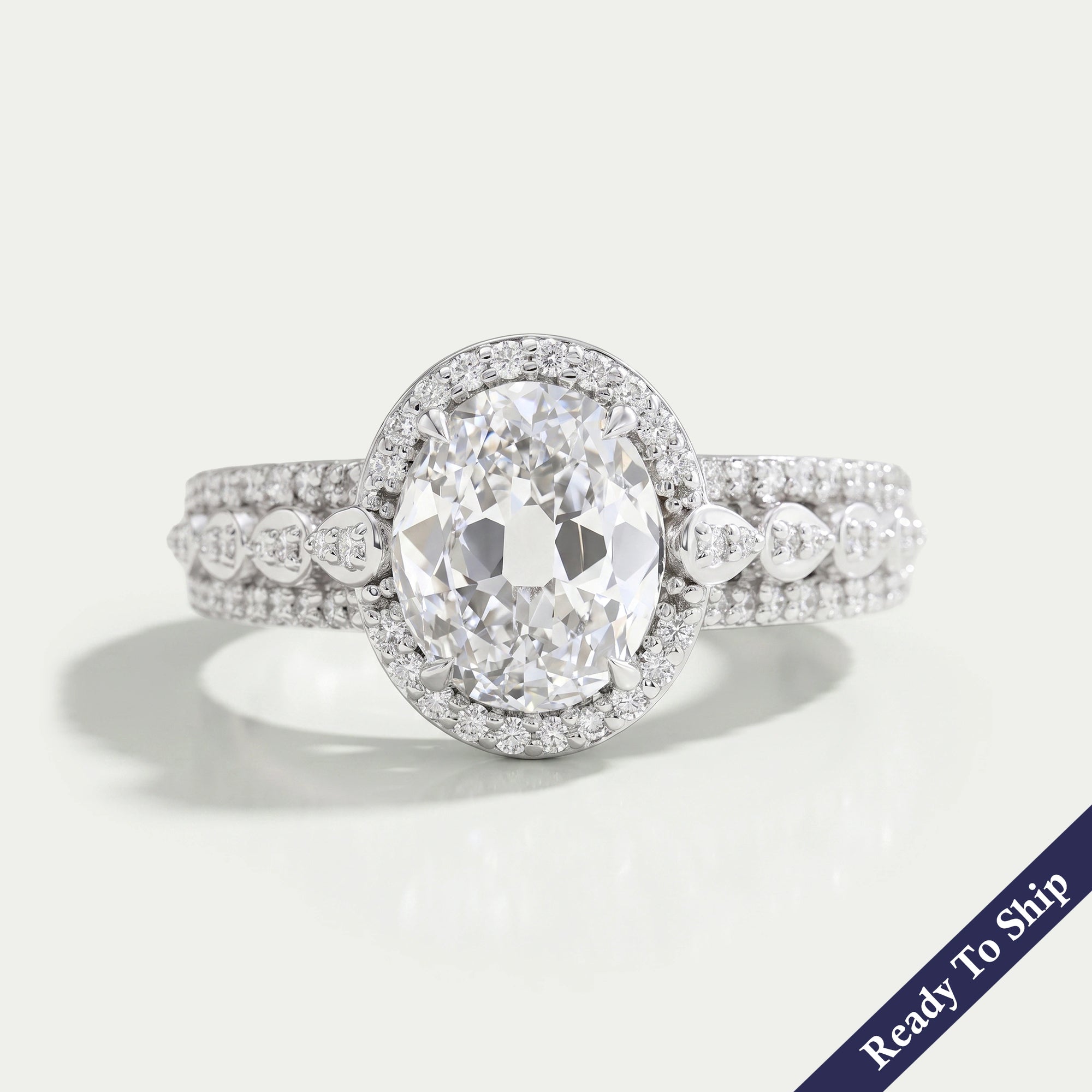 Old Mine Oval Cut Halo Diamond Engagement Ring