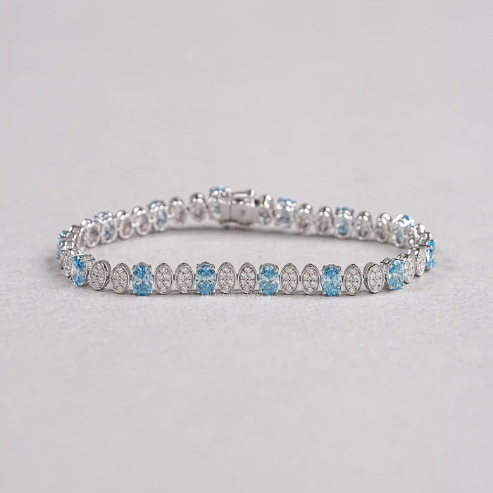 Bracelet de tennis alterné avec diamants bleus ovales et ronds