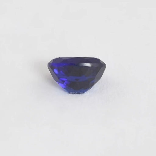 side view of oval cut lab created sapphire gemstone
