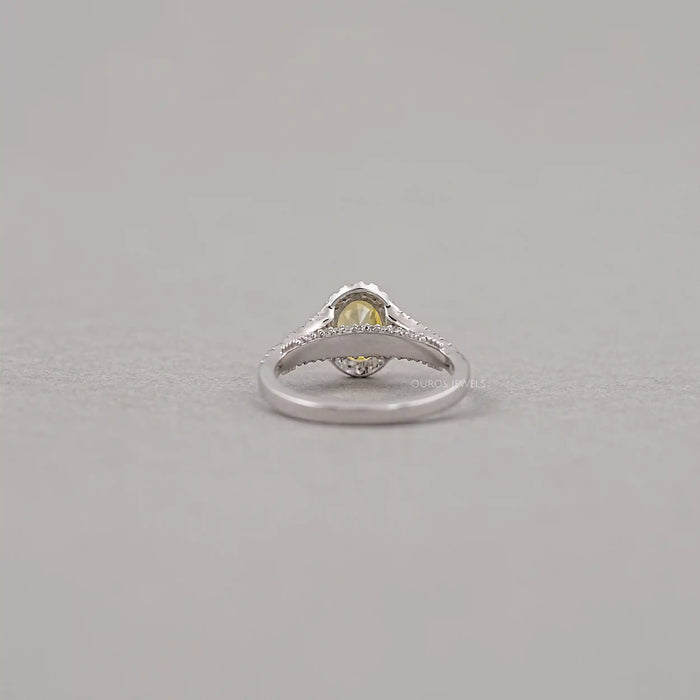 back view of yellow oval cut diamond split shank halo engagement ring