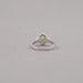 back view of yellow oval cut diamond split shank halo engagement ring