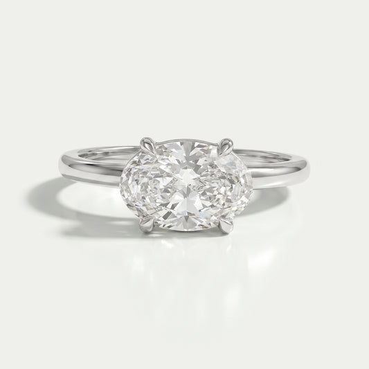 Bague solitaire de laboratoire taille poire sertie de lunette
