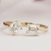 front view of oval and emerald-cut lab diamond toi et moi engagement ring