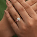 oval and pink heart-cut lab diamond toi et moi engagement ring on model's finger