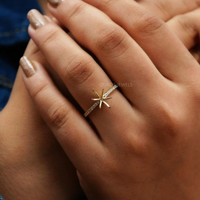 oval-shaped semi-mount accent prong setting wedding ring in finger