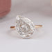top view of pear cut lab diamond button back solitaire wedding ring
