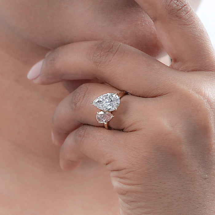pear-cut lab-grown diamond dual toi et moi engagement ring on model's finger