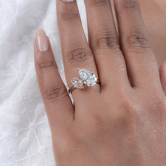 pear-cut lab-grown diamond dual toi et moi engagement ring in finger