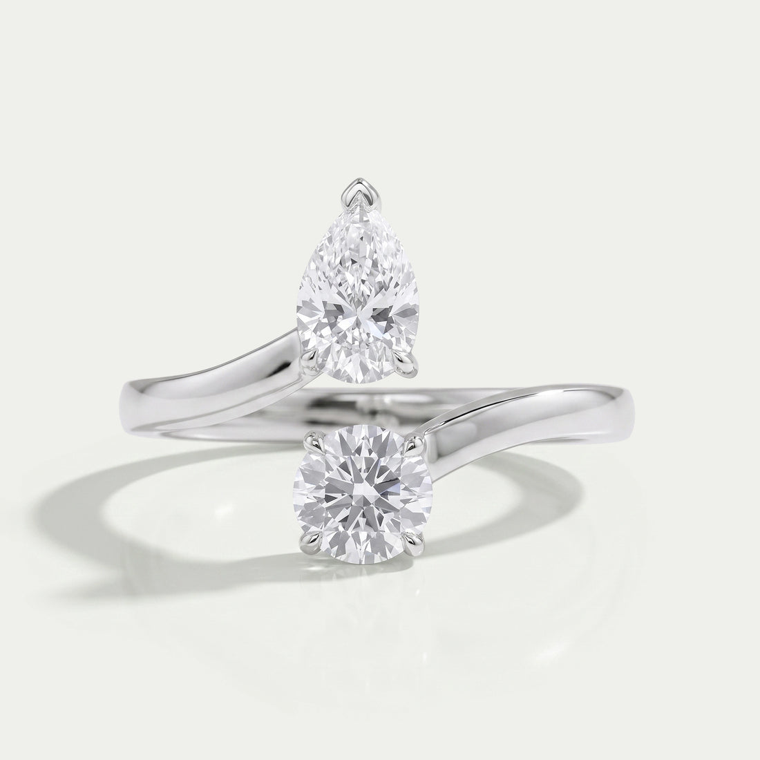 Pear and Round Diamond Bypass Ring