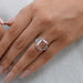 pink cushion-cut lab diamond halo 3 stone colored engagement ring in finger